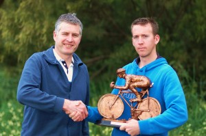 Club President Jayman Presitdge presents Scott Keeble with the Tim McArdle Perpetual Trophy