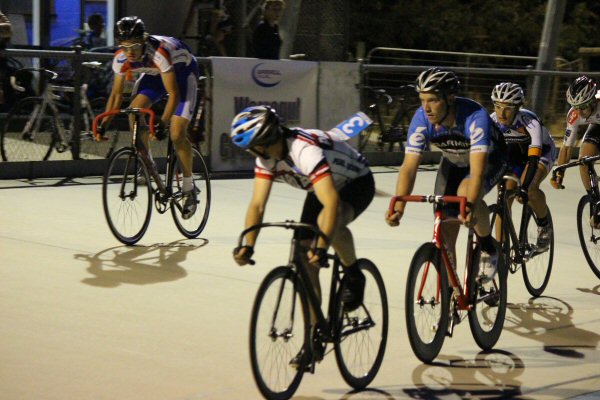 Waddell checks on the other riders with three to go