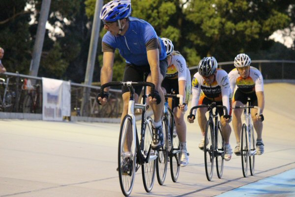 Visiting rider "52" leads the pack in the final C grade race